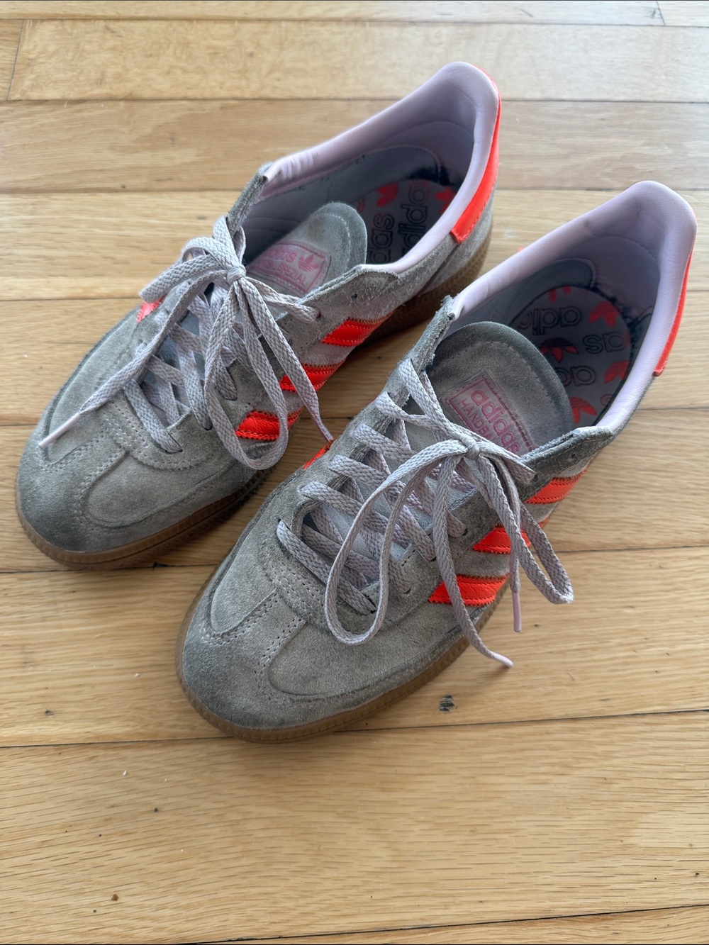 adidas womens Suede Sneakers in pink with Bright Orange Stripes
